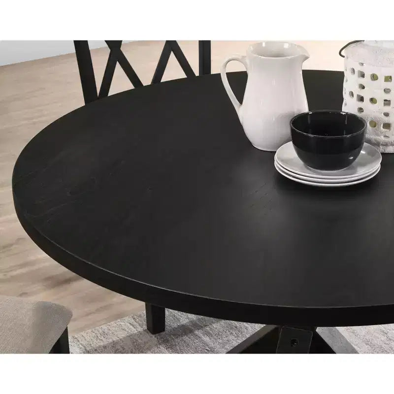 Tavolo da pranzo rotondo nero/marrone, base a gambe incrociate, 4 posti