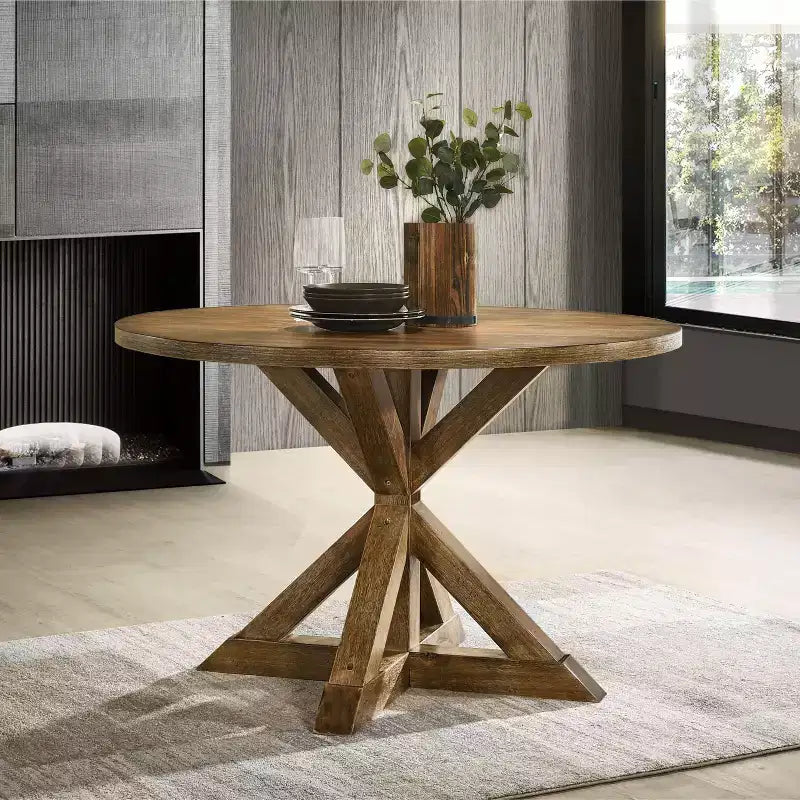 Tavolo da pranzo rotondo nero/marrone, base a gambe incrociate, 4 posti
